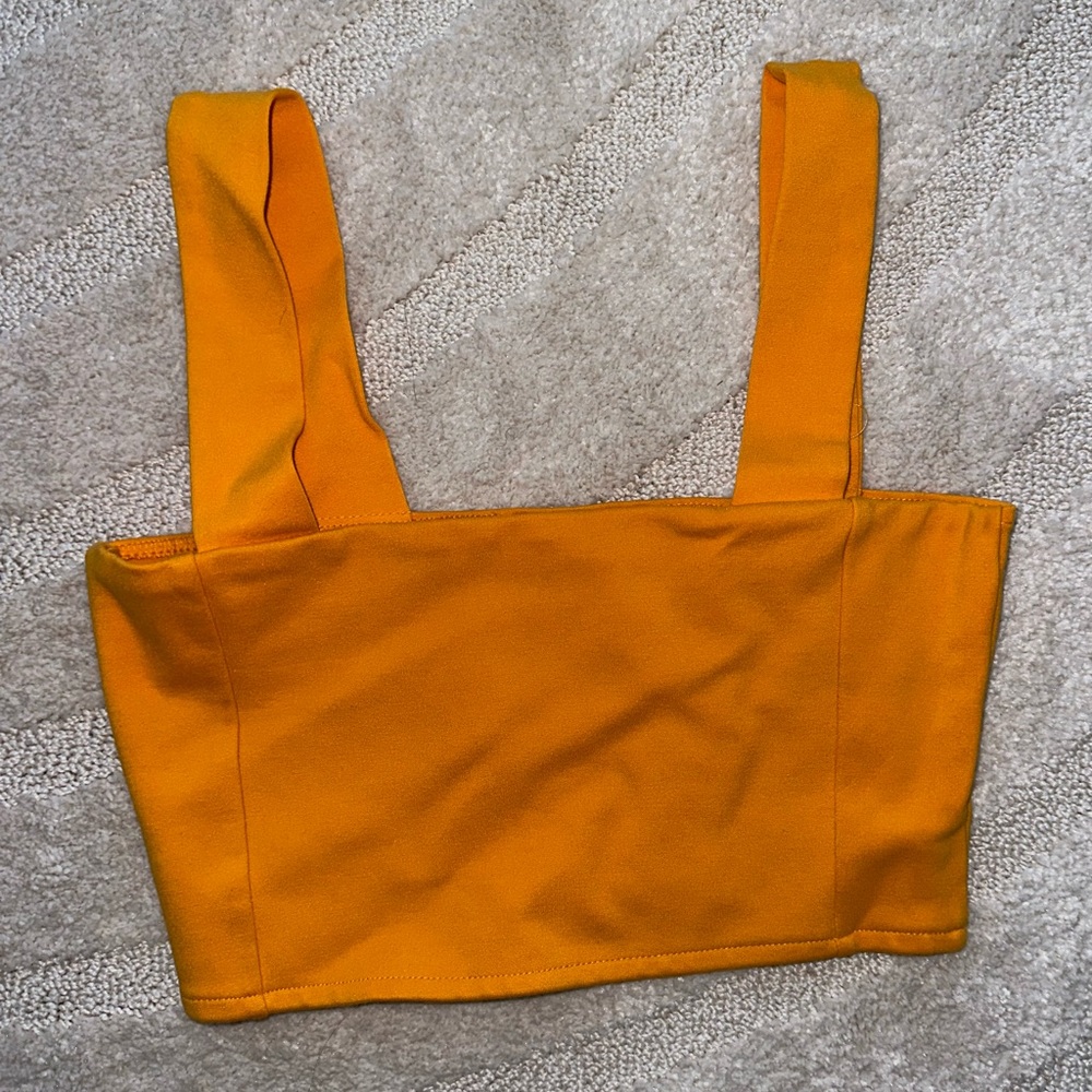 Golden yellow/orange crop top.
